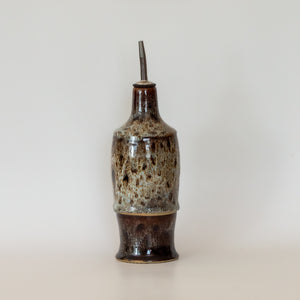 beautiful brown and blue olive oil bottle